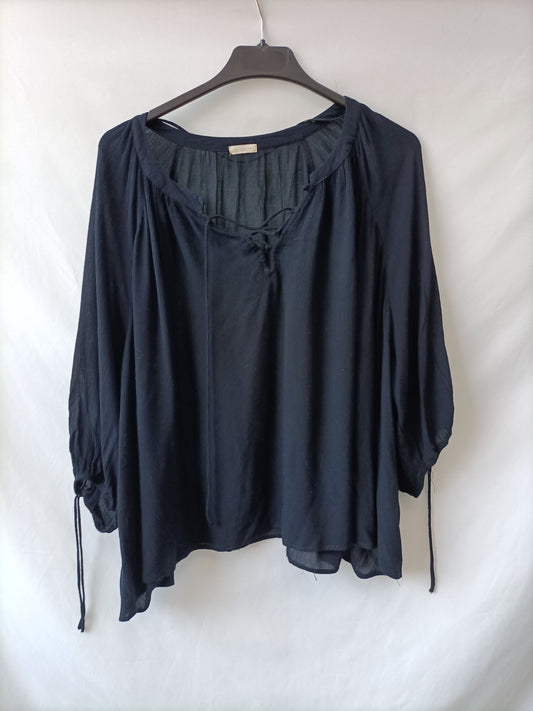 OYSHO.Blusón negro  T.M