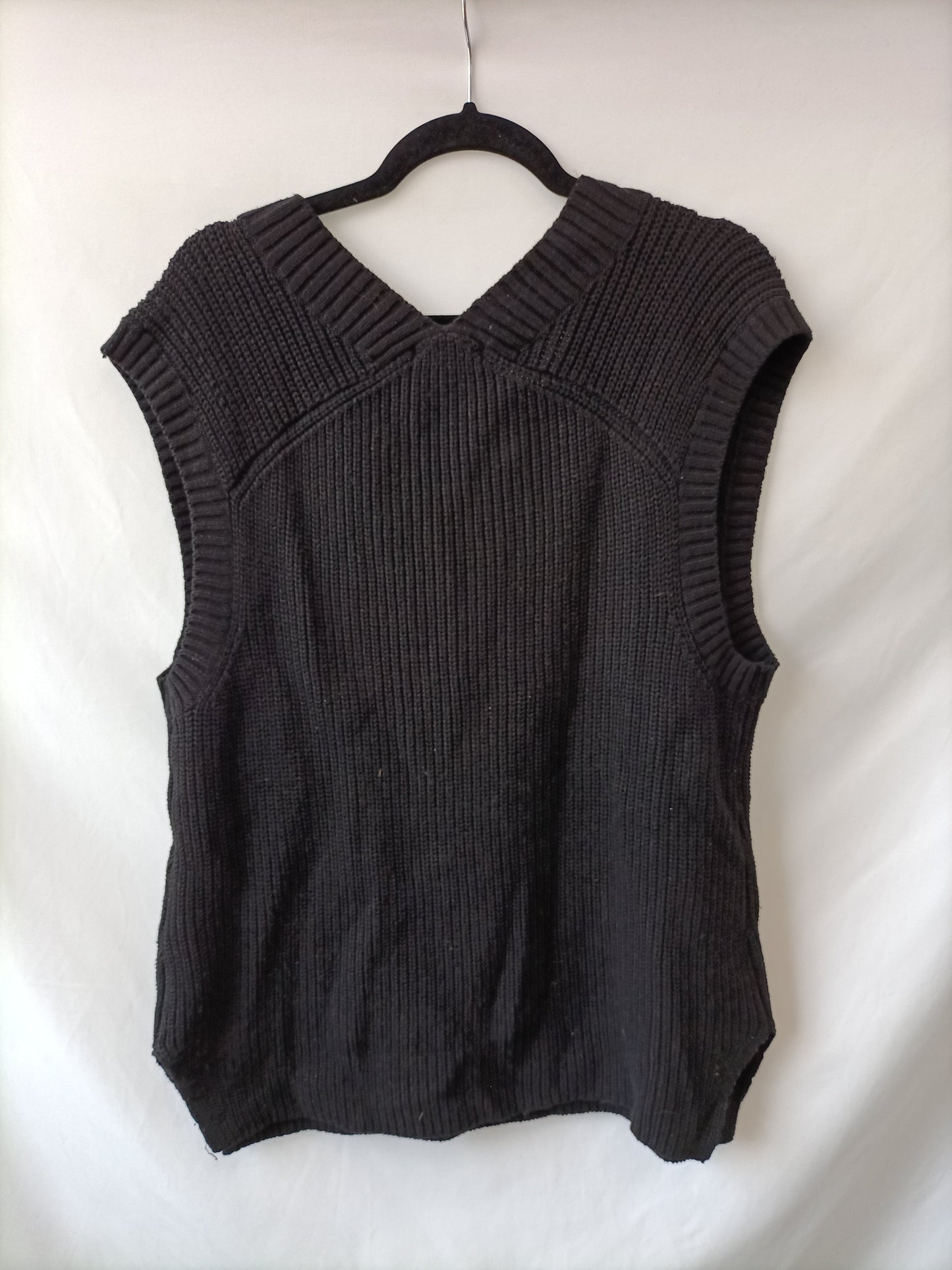H&M. Chaleco negro punto T.l