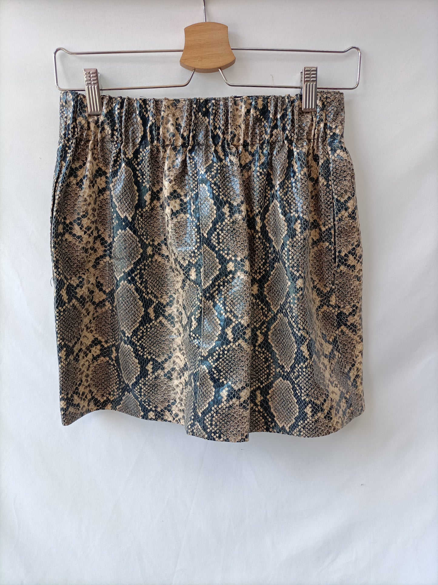 ZARA. Falda animal print T.xs