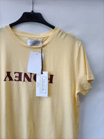 NA-KD. Camiseta amarilla T.xxs