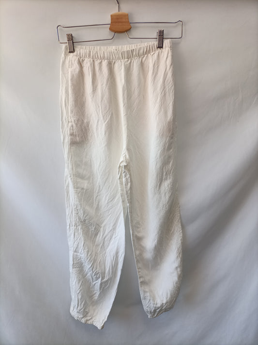 OYSHO.Pantalones fluidos blancos T.XS