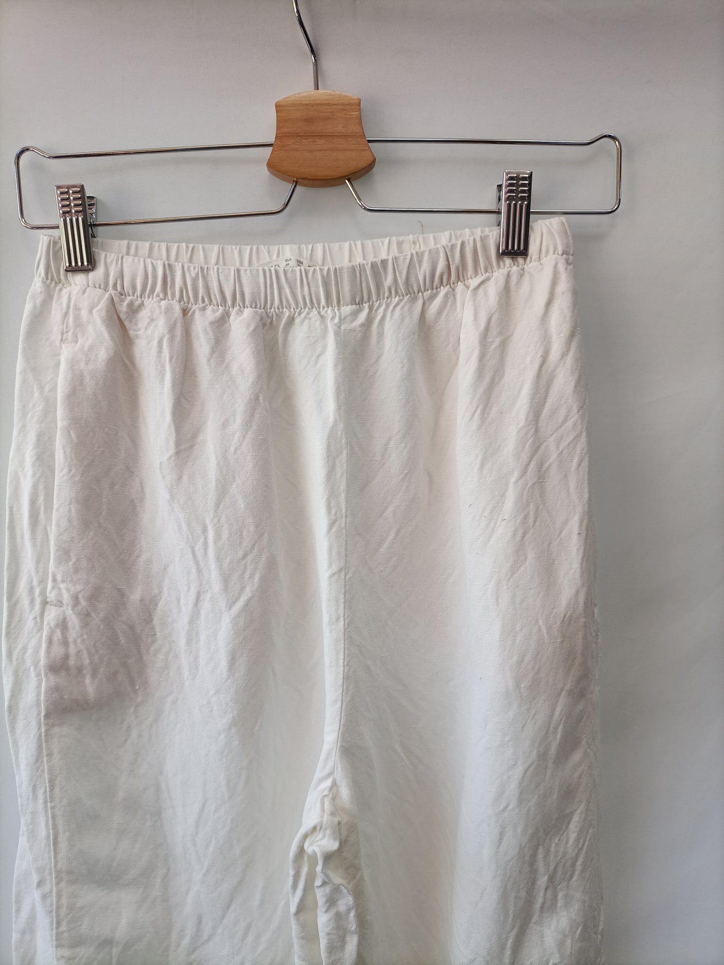 OYSHO.Pantalones fluidos blancos T.XS
