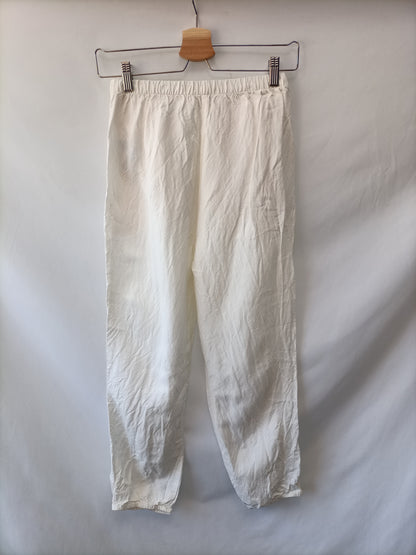 OYSHO.Pantalones fluidos blancos T.XS