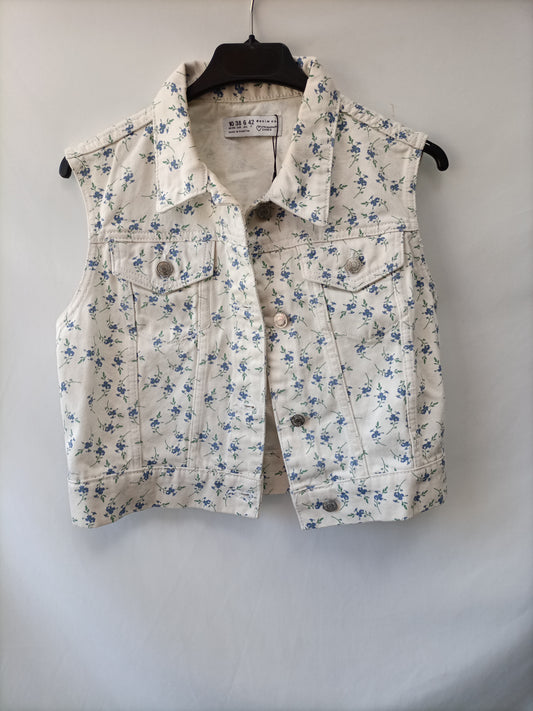 PRIMARK.Chaleco denim florecitas T.38
