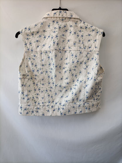 PRIMARK.Chaleco denim florecitas T.38