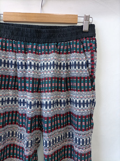 MAJE. Flowy trousers with ethnic print TS