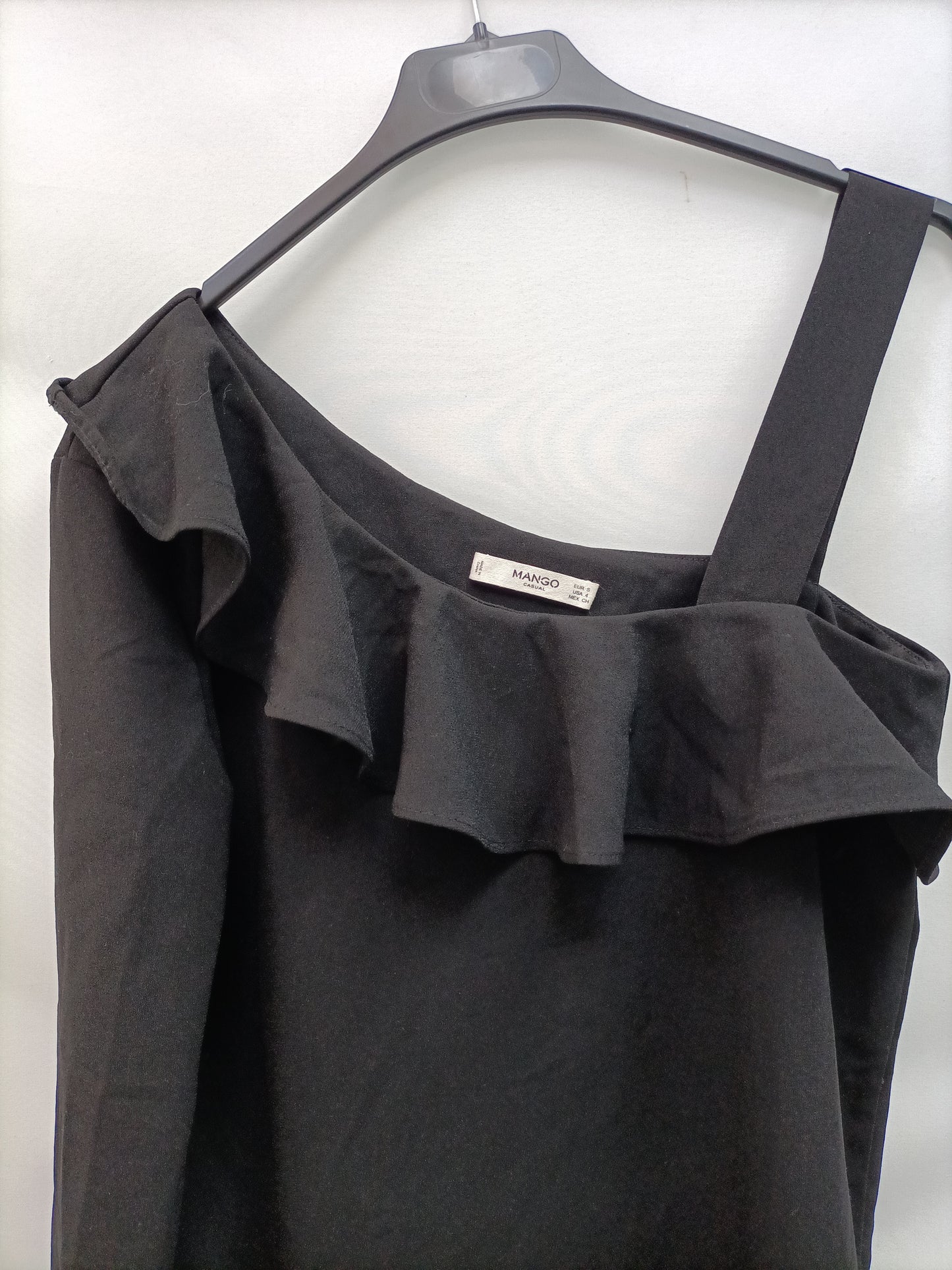 MANGO. Asymmetrical black dress with Ts buttons