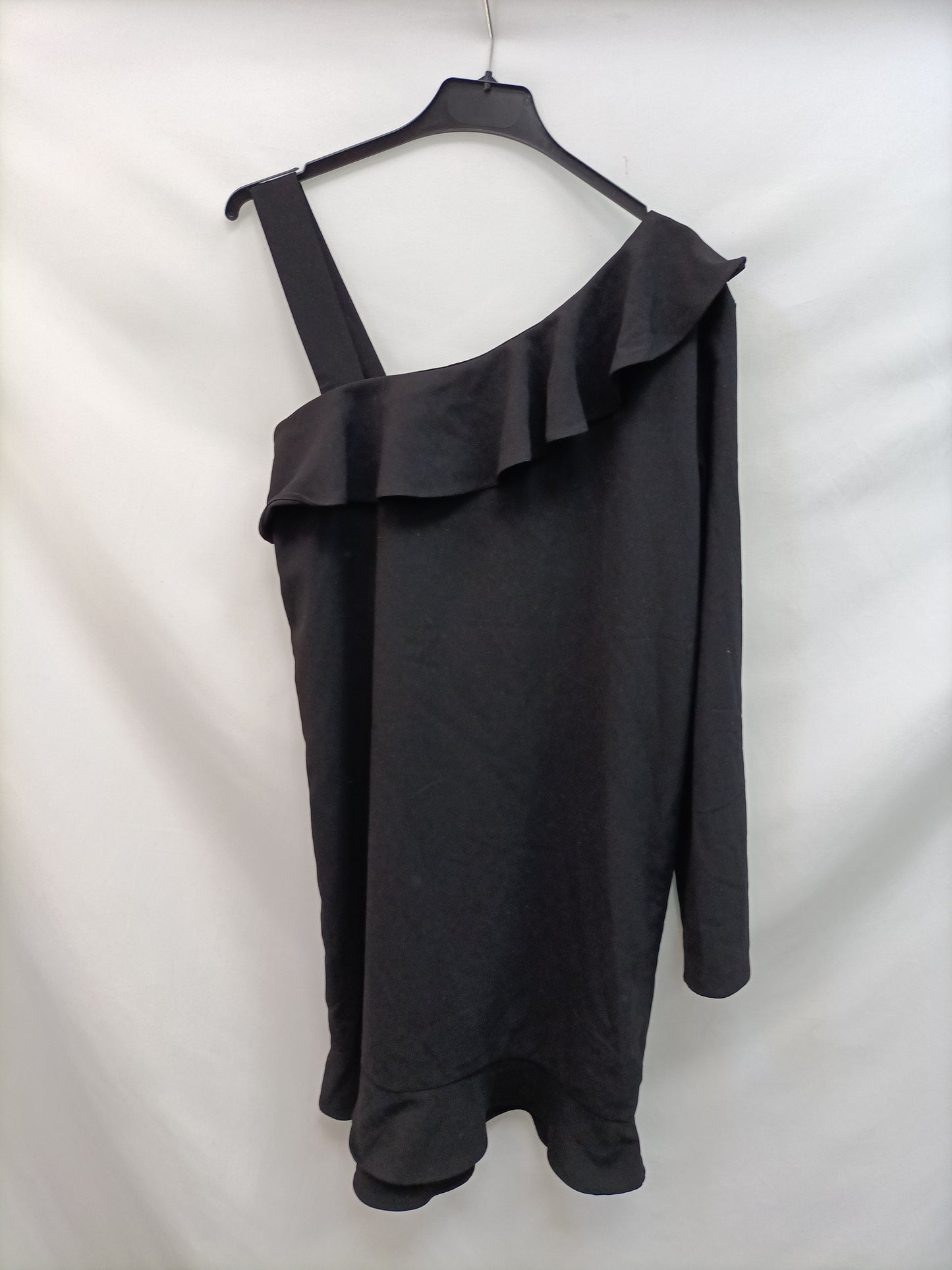 MANGO. Asymmetrical black dress with Ts buttons