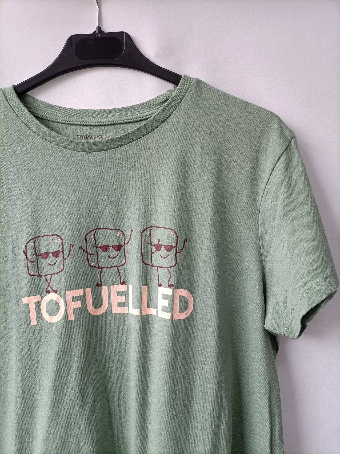 PRIMARK. Camiseta verde dibujo T.m