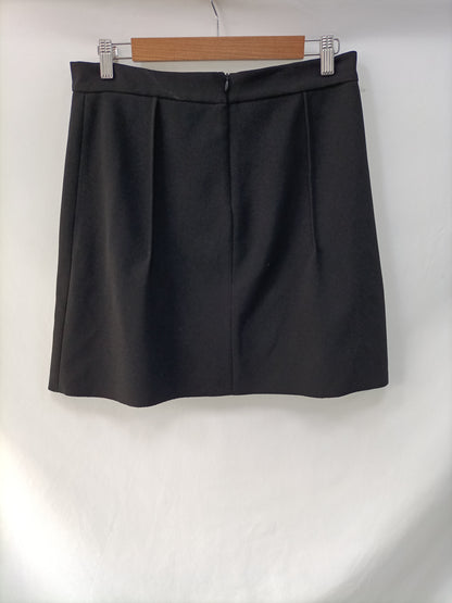 BIMBA Y LOLA. Falda negra corta T.42