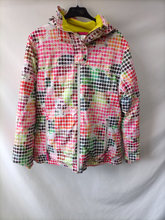 DECATHLON. Abrigo impermeable lunares T.s