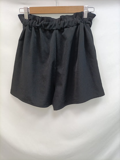 STRADIVARIUS. Pantalón Fluido negro T.s