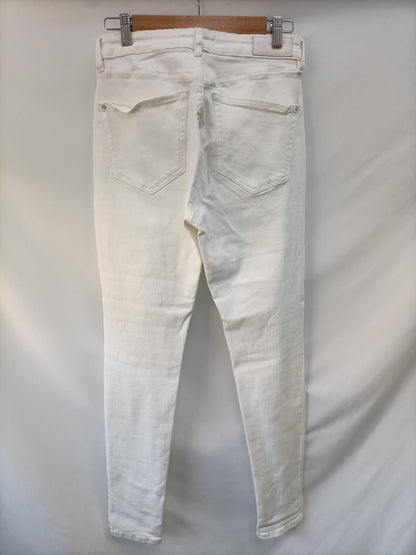 MANGO. Pantalón pitillo blanco T.40
