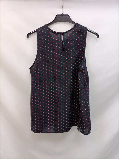 MANGO. Top negro estampado T.s