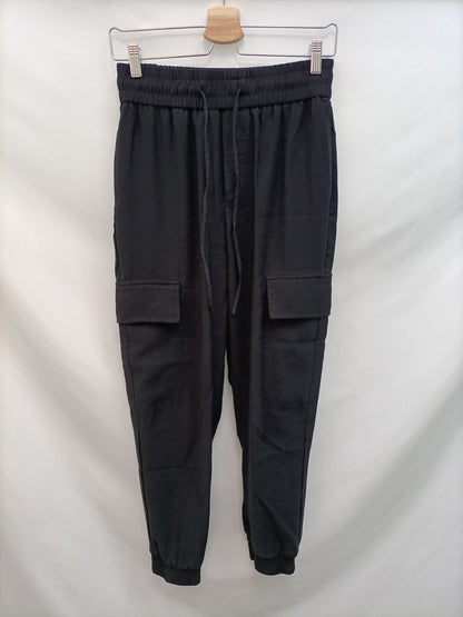 ZARA. Pantalón negro cargo T.s