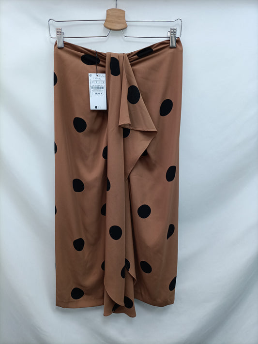 SFERA. Falda midi lunares T.s