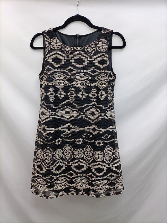 OTRAS. Vestido corto trenzado Tu(m)