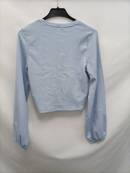 MONKI. Top nudo azul T.xs