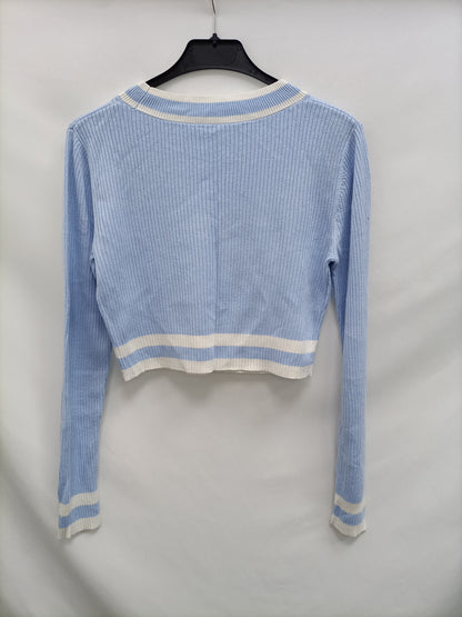 OTRAS. Top canalé azul y blancos T.u(s)