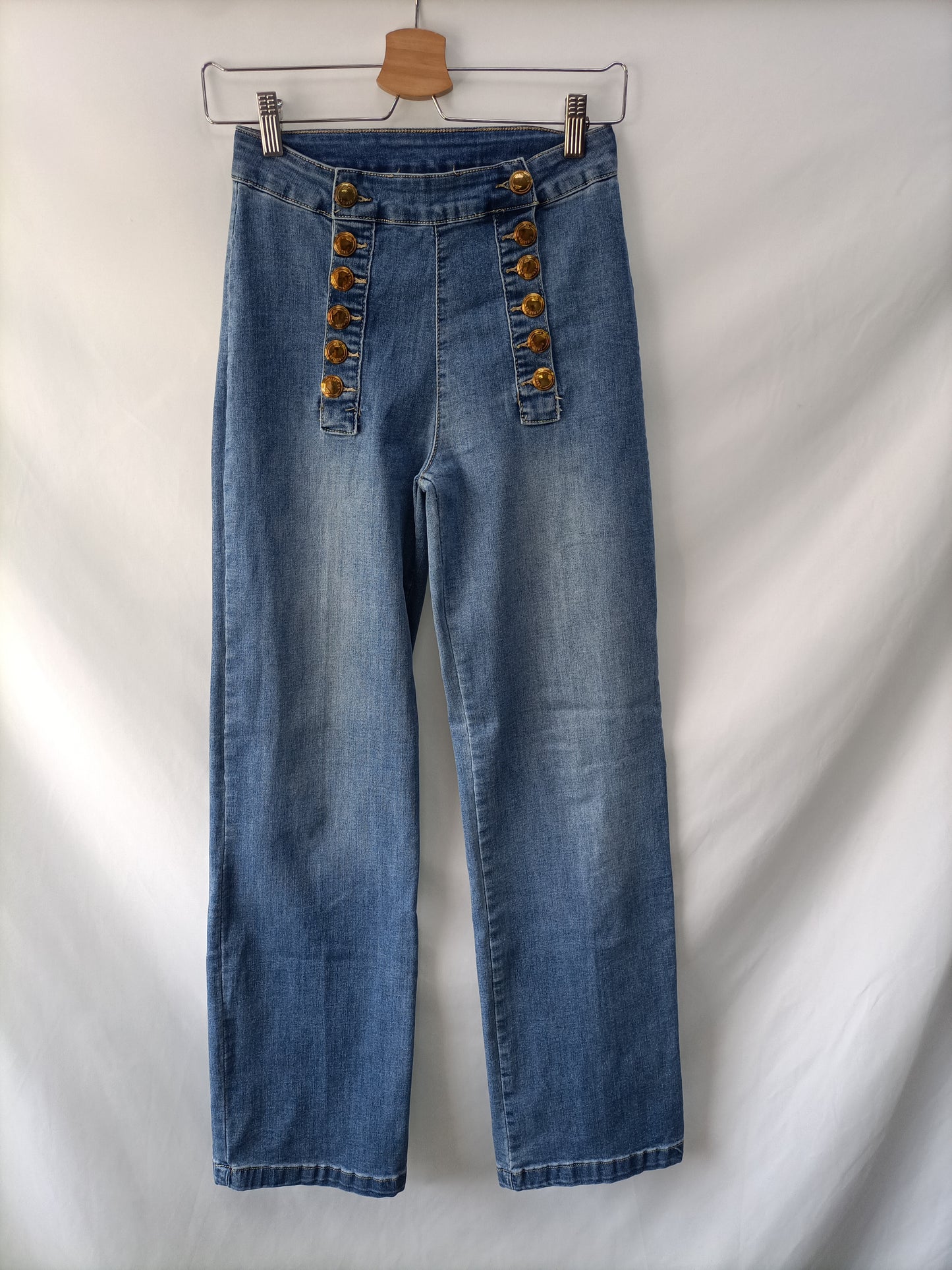 OTHER. Jeans with Ts buttons