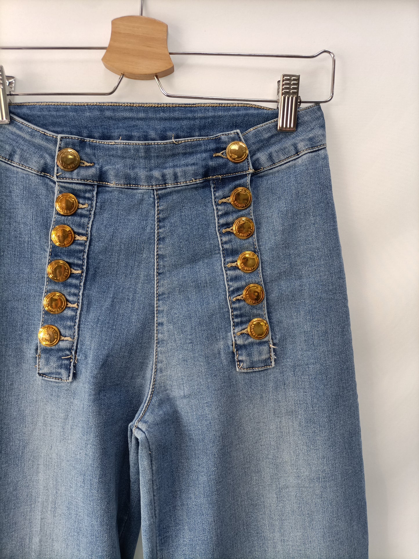 OTHER. Jeans with Ts buttons