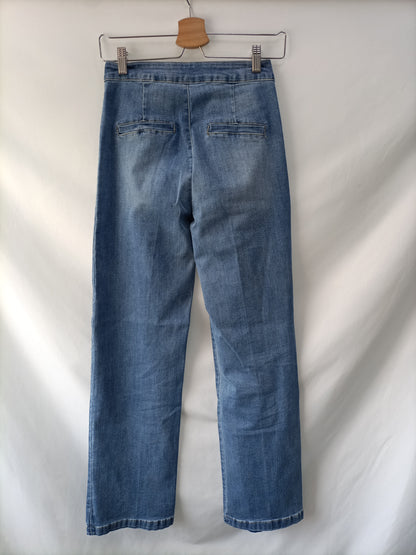 OTHER. Jeans with Ts buttons