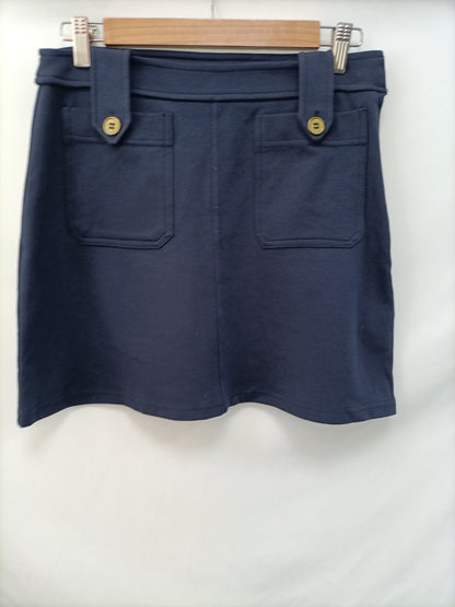 H&M. Falda azul elástica T.m