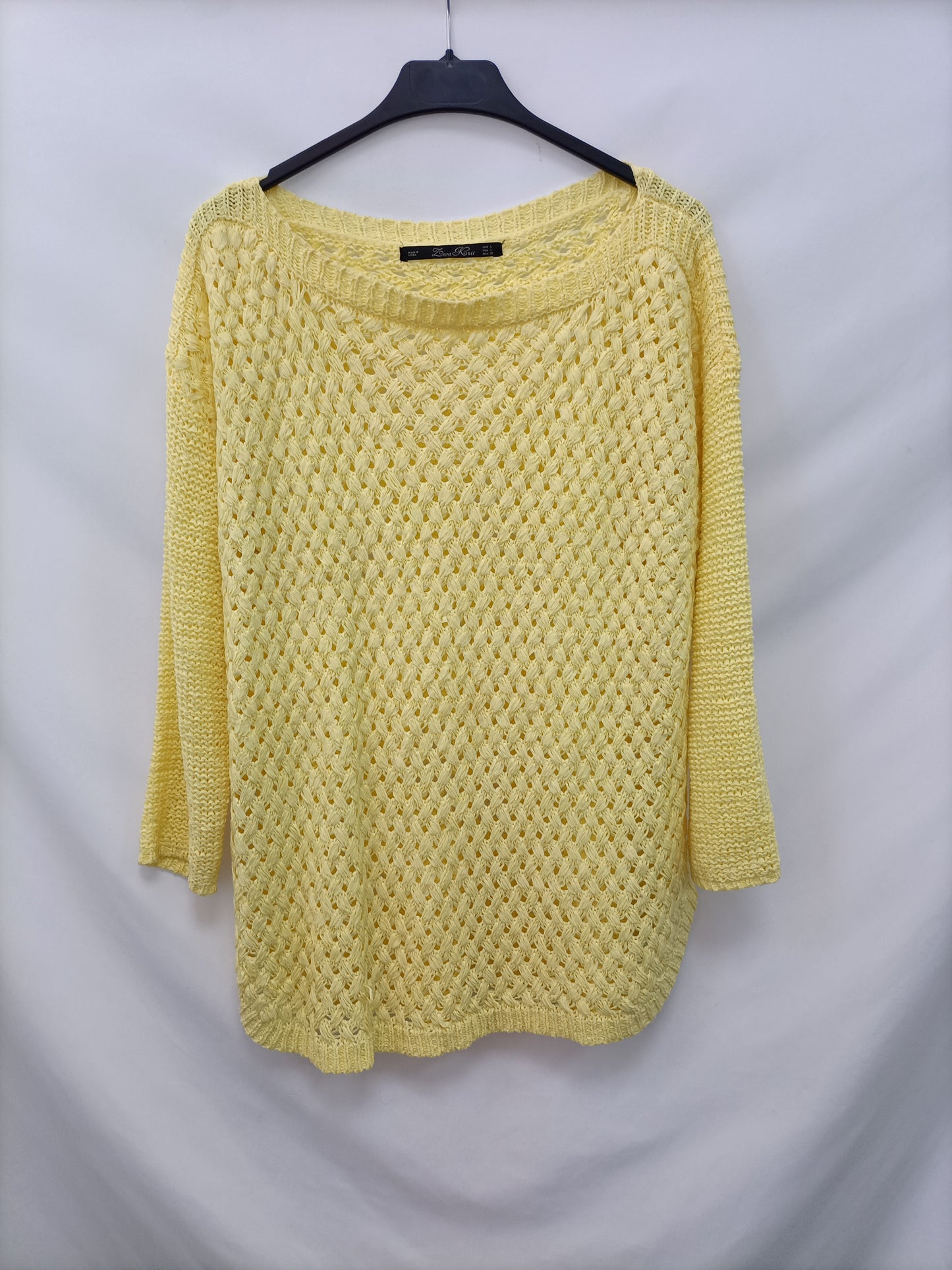 ZARA. Jersey amarillo T.l