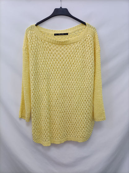 ZARA. Jersey amarillo T.l