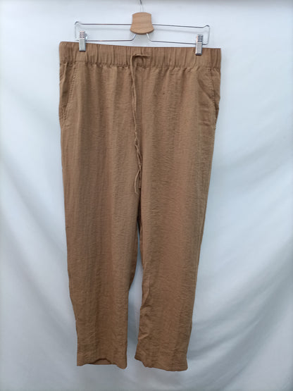 H&M. Pantalón Fluido Camel T.l