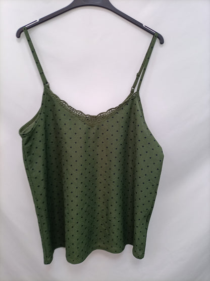 KIABI. Green polka dot top size 1/2XL