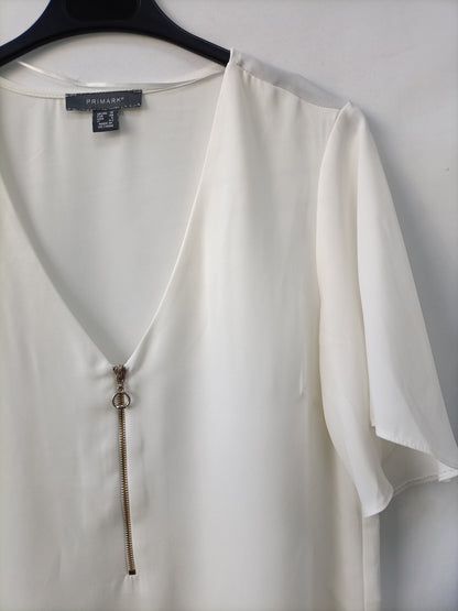 PRIMARK. White zip-up blouse, size 38