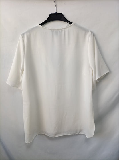 PRIMARK. White zip-up blouse, size 38