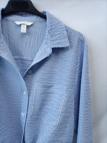 H&M. Camisa rayas nudo T.38