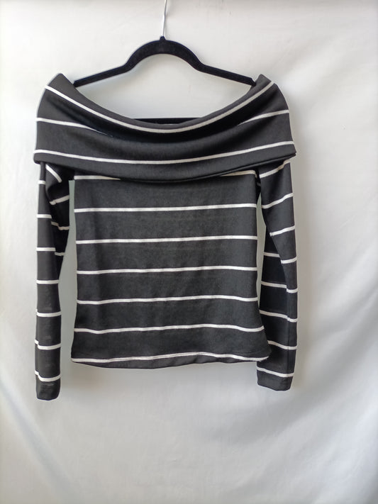ZARA. Jersey negro rayas T.m