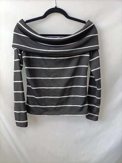 ZARA. Jersey negro rayas T.m