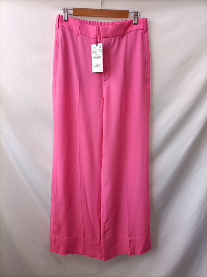 ZARA. Pantalón rosa Fluido T.m