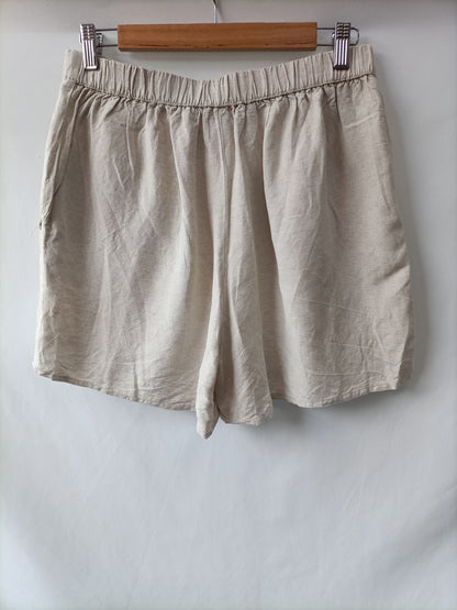 OYSHO. Pantalón beige lino T.m