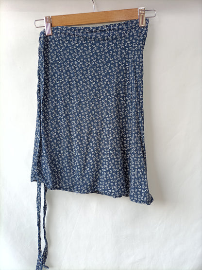 BRANDY MELVILLE. Falda pareo flores T.u(s)