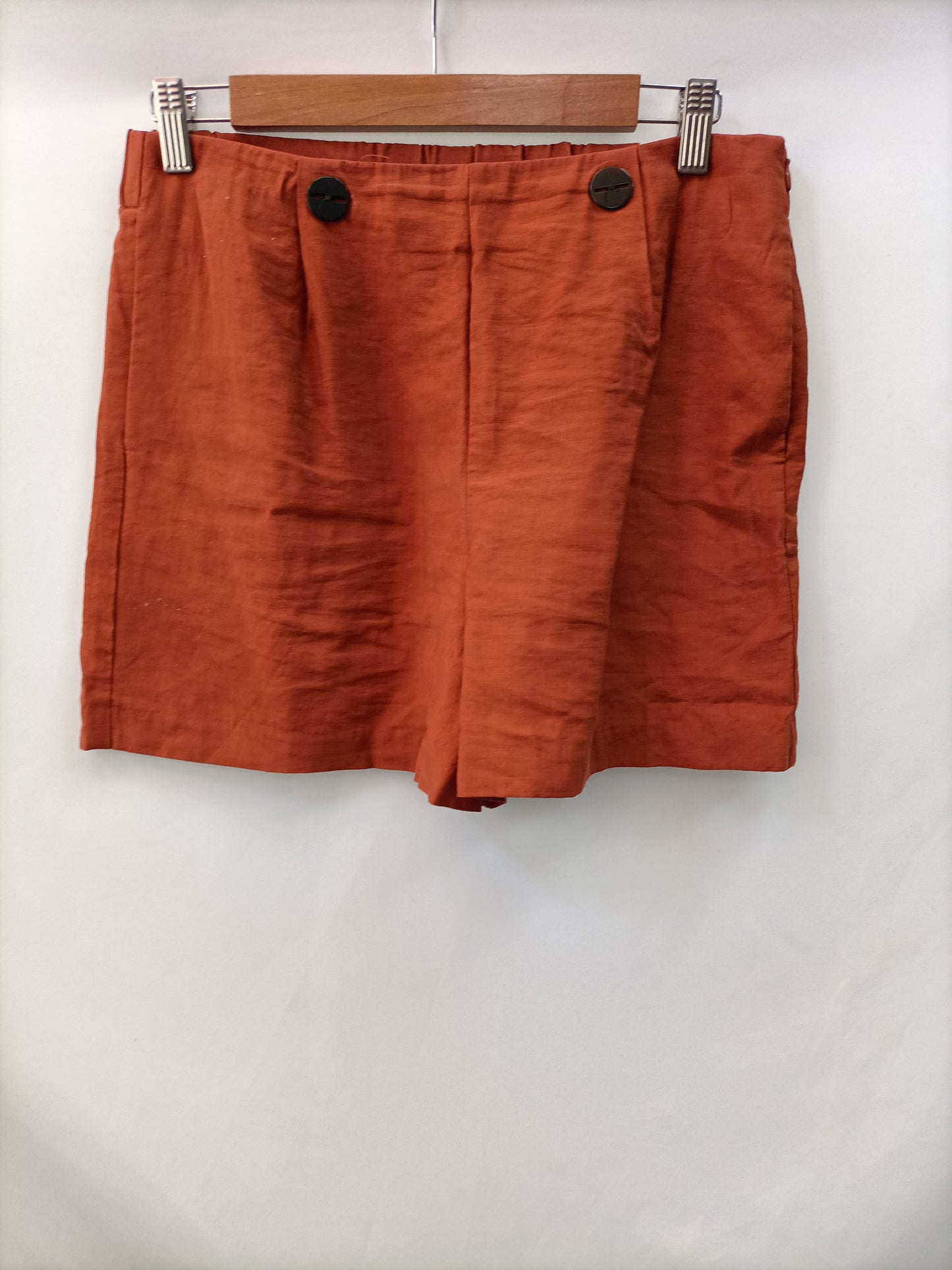 MANGO. Short fluido teja T.38