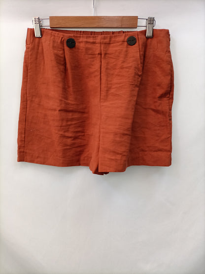 MANGO. Short fluido teja T.38