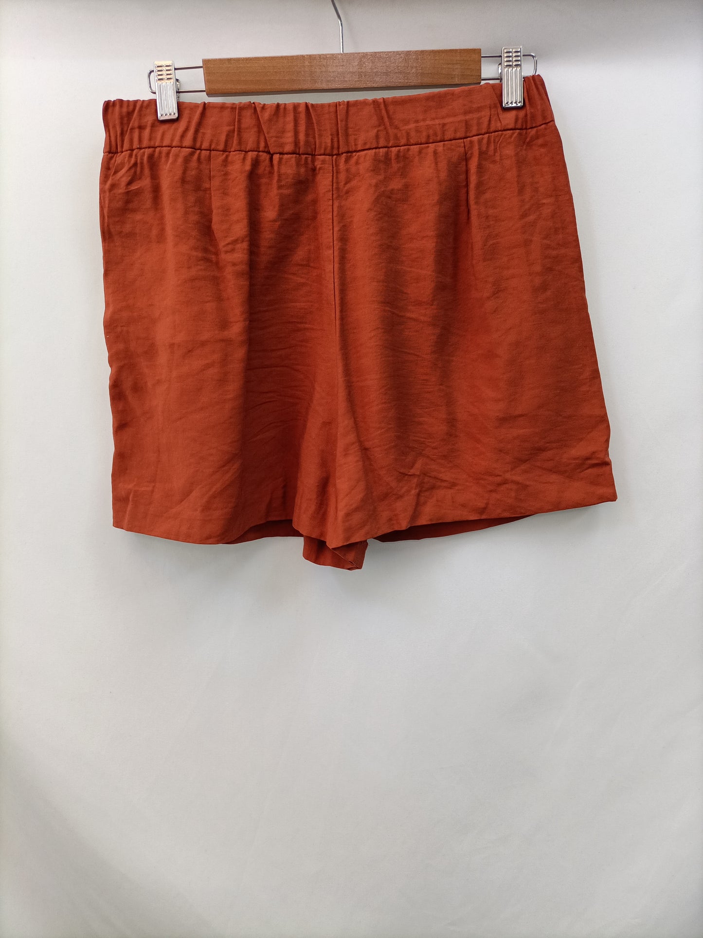 MANGO. Short fluido teja T.38