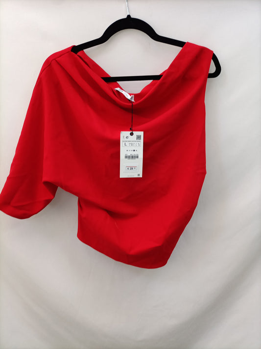 ZARA. Top rojo asimetrico T.l