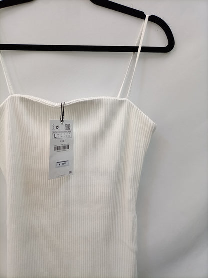 ZARA. Top blanco canalé T.l