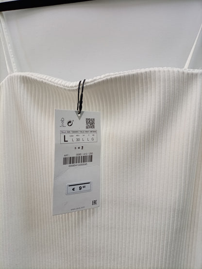 ZARA. Top blanco canalé T.l