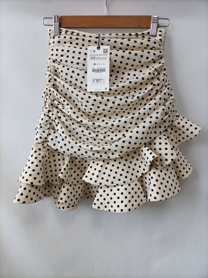 ZARA. Falda beige lunares T.xs