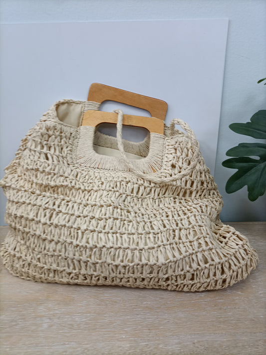 OTRAS. Bolso beige rafia