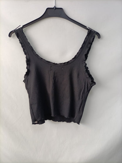 BERSHKA. Top canalé negro T.m