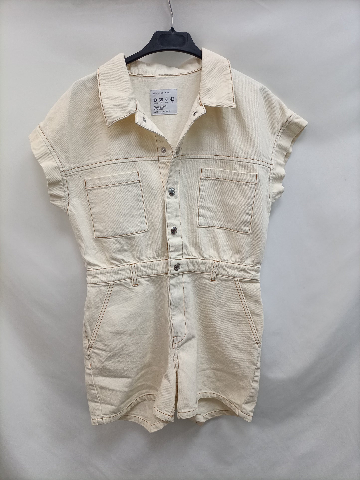 PRIMARK.Mono corto beige denim T.38 (TARA)