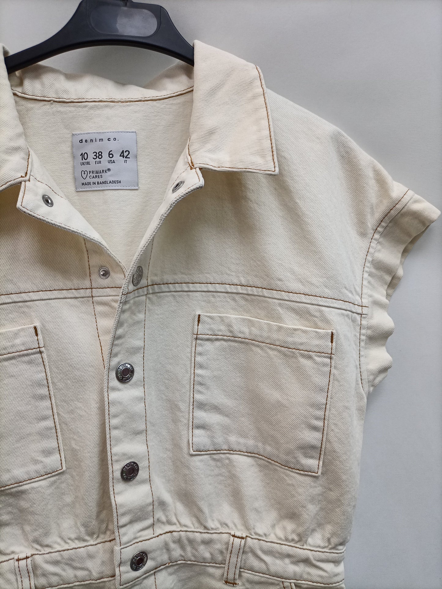 PRIMARK.Mono corto beige denim T.38 (TARA)